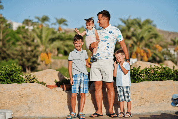 Family enjoying a sunny day outdoors.