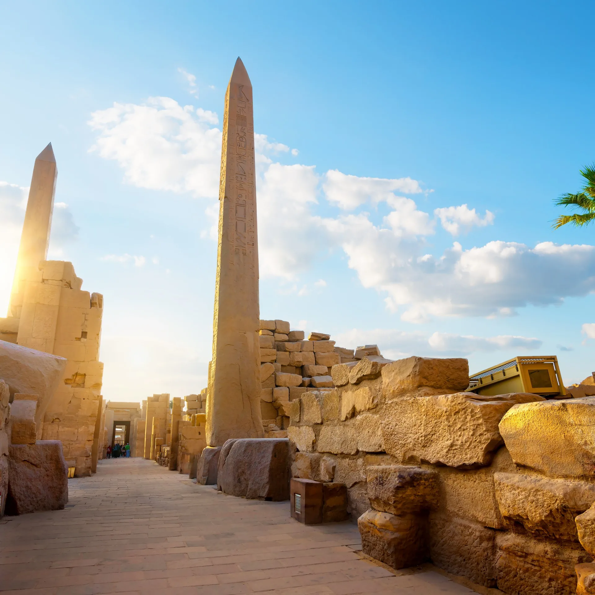 Ancient Egyptian obelisk amid historic ruins