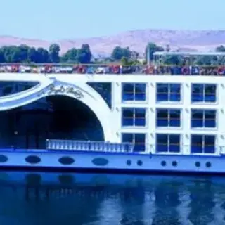 Luxurious cruise ship on calm waters.